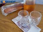 Жителя Харцызска привлекли за продажу самогона, продукт конфискуют полицейские 