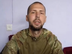 Черепа и черное солнце «спалили» азовца из Запорожья, осужденного на 18 лет колонии в Донецке