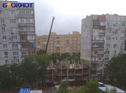 «РосКапСтрой» хвастается в Минстрое РФ, а у самих долгоиграющий недострой в Мариуполе